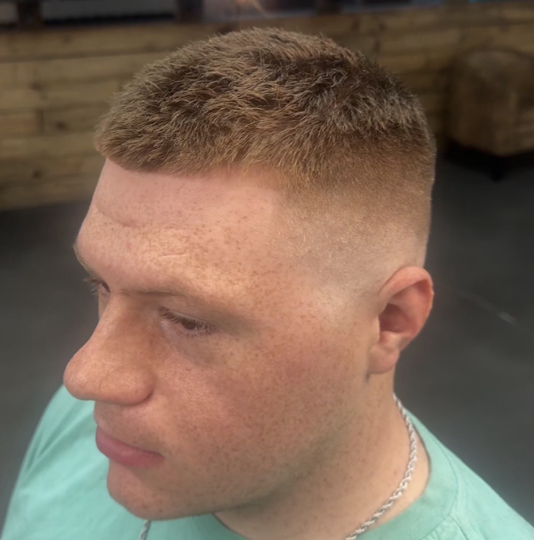 High skin fade with a short textured crop