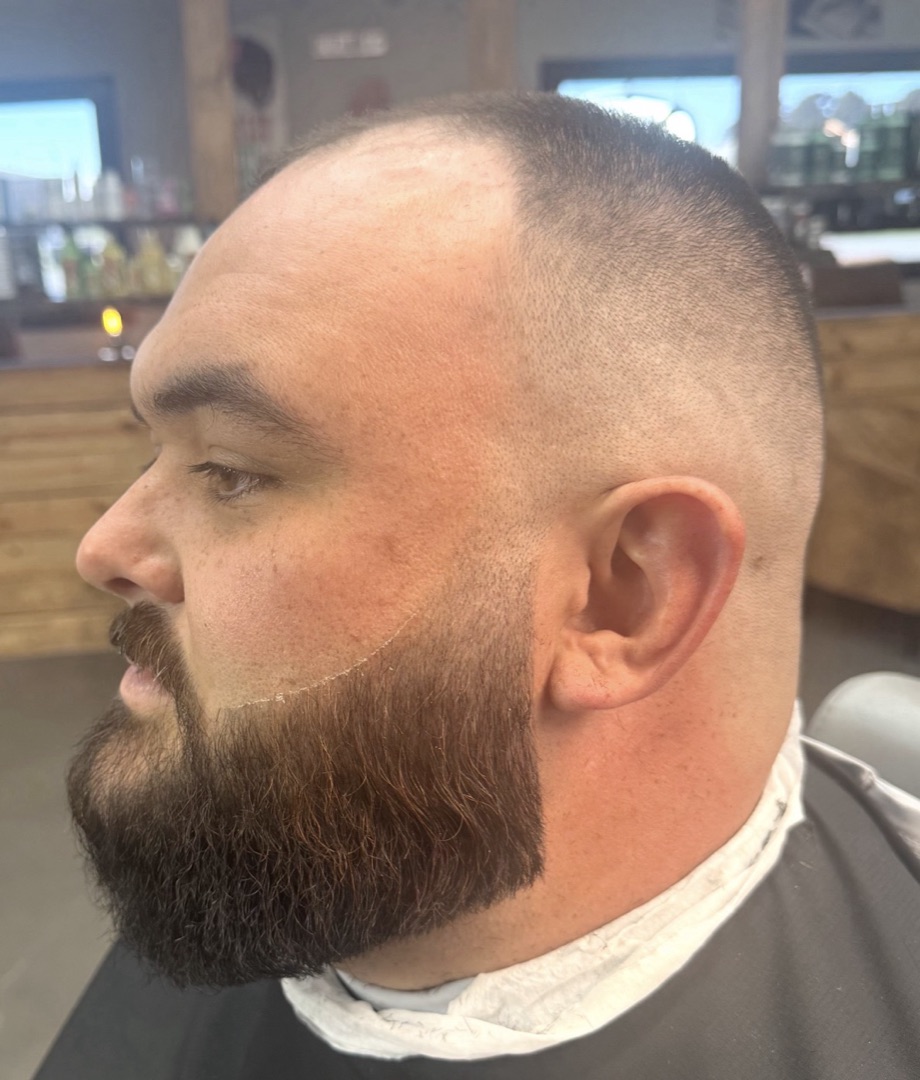 Sculpted beard trim with a clean skin fade